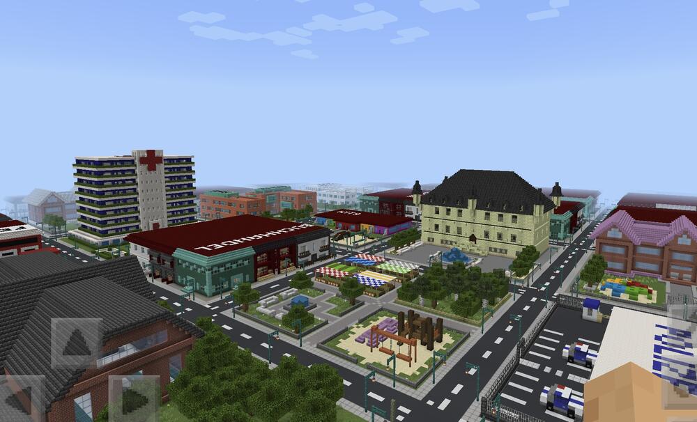 Das Pilotprojekt MineQuartier nutzt die Umgebung von Minecraft, um Schülerinnen und Schüler in einer neu konzipierten Unterrichtsreihe an das Thema „Energie- und ressourcenschonende Quartiersentwicklung“ heranzuführen.  © Minecraft Education Edition MineQuartier UOS